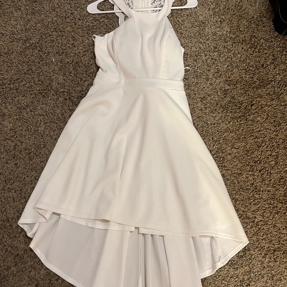 Tigerlilly dress, size 9, never worn. Has tags still. Bought it in october.